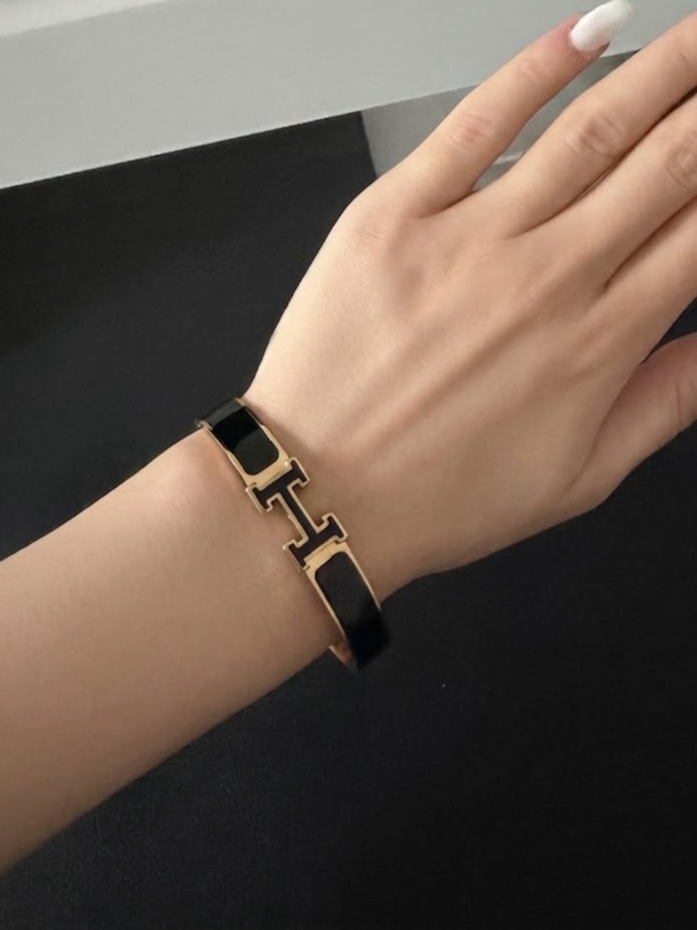 Hermes Black and Gold H Bracelet